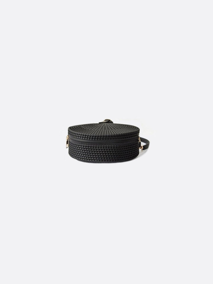 Bolso redondo de piel<br>Amira