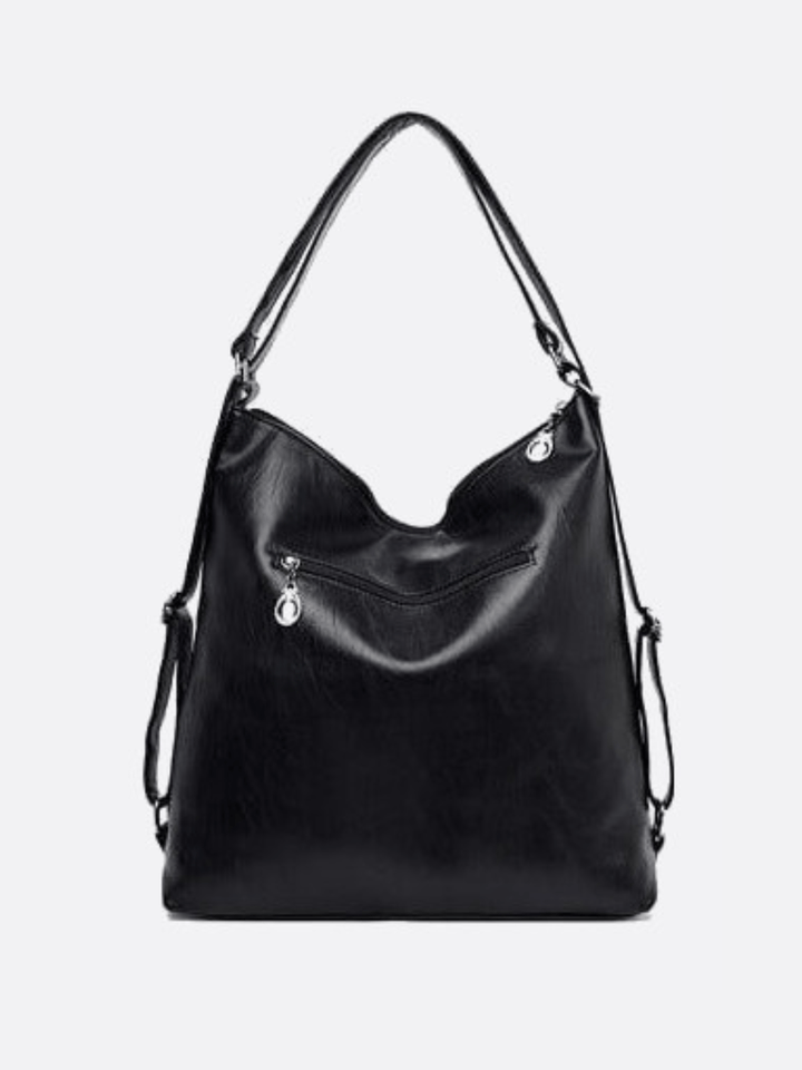 Bolso bandolera de piel convertible en mochila