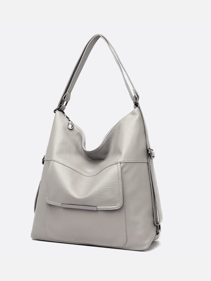 Sac cuir gris transformable sac à dos