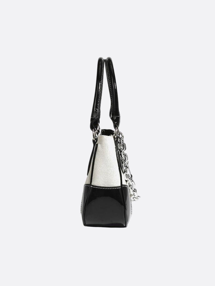 Bolso bandolera de lona y piel