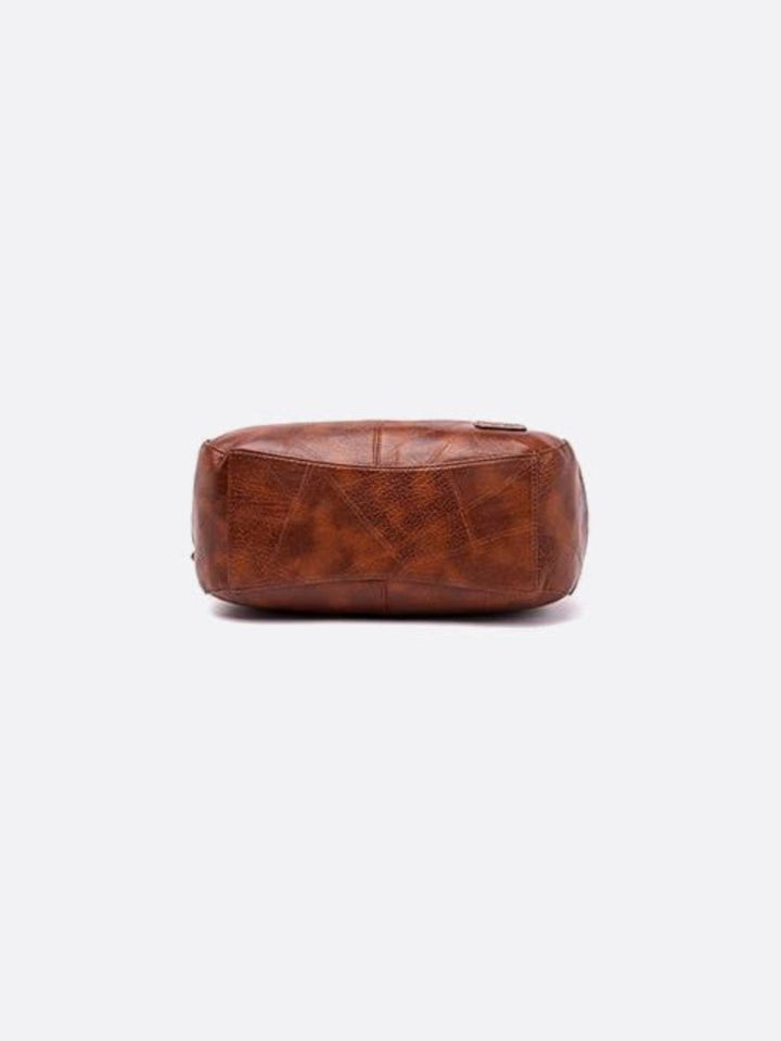 Bolso de mano de cuero<br>Amaya