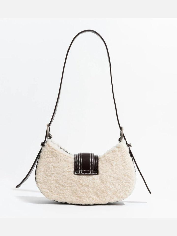 Moumoute y bolso de cuero